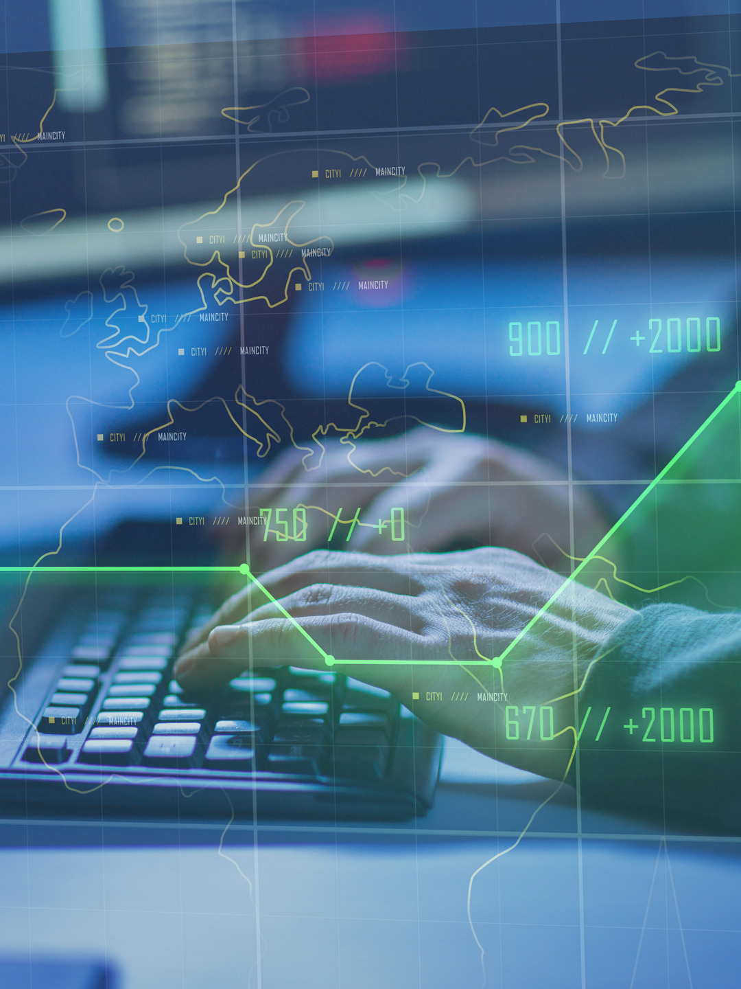 En person som skriver på ett tangentbord framför en bildskärm.