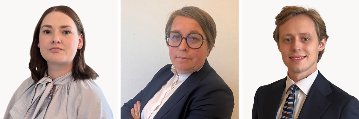 Tre personer i kostym och slips poserar för en bild.