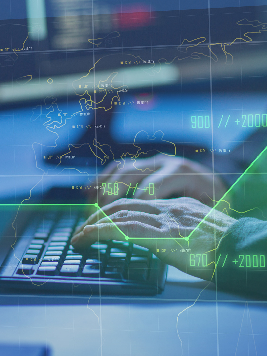 En person som skriver på ett tangentbord framför en bildskärm.